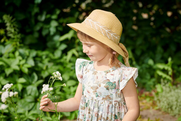 angelic child with flowers
