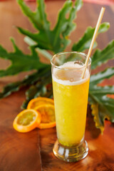 Tall glass of fresh Lulo juice, a traditional Colombian tropical drink