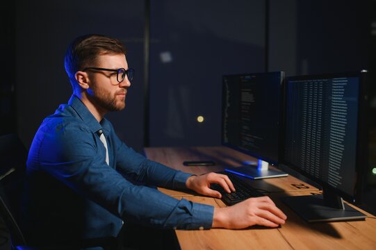 programmer working at desk in office
