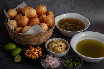 Exploring the Tangy, Spicy, and Refreshing Delight of Pani Puri. India's Favourite Street Food Experience. Selective focus. 