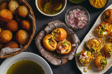 Exploring the Tangy, Spicy, and Refreshing Delight of Pani Puri. India's Favourite Street Food Experience. Selective focus. 