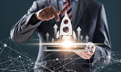 Business growth. Professional businessman hold rocket