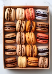 Colorful french macaroons in gift box on color background. Top view of various assorted flavors of classic French macarons in a gift box,almond cookies,Valentine's day sweet gift,holiday,celebration.