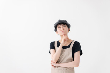悩む飲食業の女性