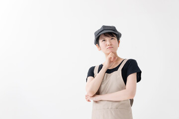 悩む飲食業の女性