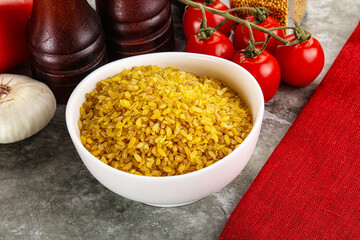 Dry wheat bulgur cereal heap