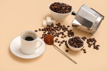 Geyser coffee maker with bowls of beans on beige background