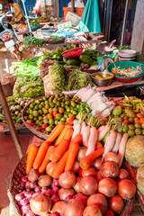 Tropical fruits and vegetables on local street market in Cambodia