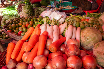 Tropical fruits and vegetables on local street market in Cambodia