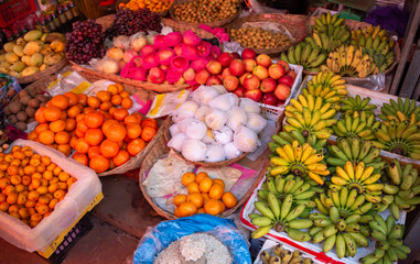 Tropical fruits and vegetables on local street market in Cambodia