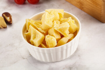 Crushed parmesan cheese in the bowl