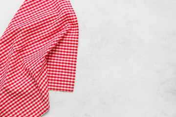 Red checkered napkin on white background