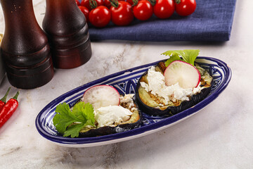 Grilled eggplant with cheese and radish