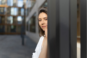 portrait of a woman in a business district