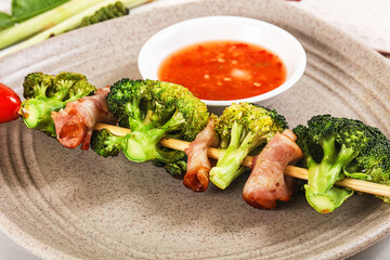 Thai Street foof satay with bacon and broccoli