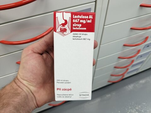 Prague, Czech Republic - July 10 2024: LACTULOSE AL box of medication with LACTULOSE active substance by ALIUD PHARMA, used for treatment of constipation and hepatic encephalopathy.
