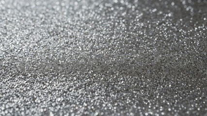 Close-up of reflective and glittering metallic surface with numerous tiny sparkles creating a dazzling effect.