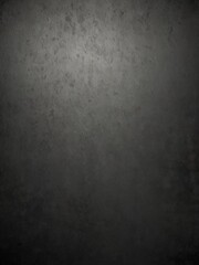 Fototapeta premium A textured gradient background blending gray and black with a grainy finish, suitable for minimalist and modern designs.