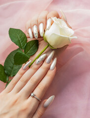 Female Hands with beautiful pearl manicure