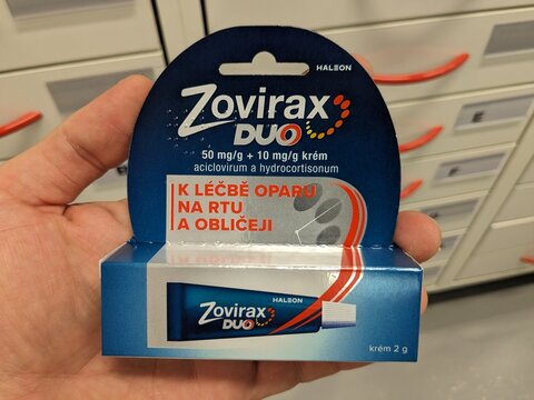Prague, Czech Republic - July 9 2024: ZOVIRAX DUO topical cream with ACYCLOVIR and HYDROCORTISONE active substances by GLAXOSMITHKLINE, used for cold sore treatment.