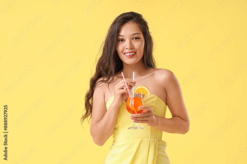 Sticker young asian woman with aperol spritz cocktail on yellow background