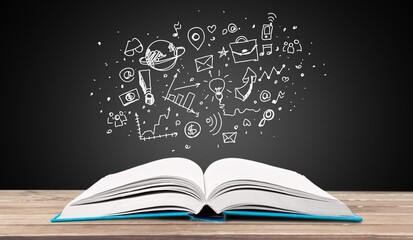Open old reading book on table with business illustration