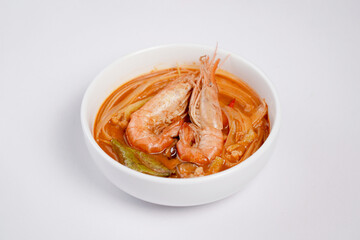 Tom-yum soup with big shrimp in bowl white background