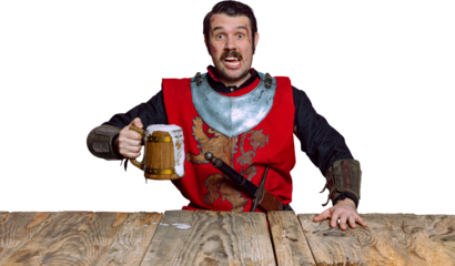 Tasting beer. Portrait of medieval warrior or knight with dirty wounded face holding wooden mug of beer isolated on transparent background. Comparison of eras, history, renaissance style. Oktoberfest