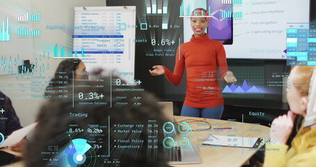 Image of financial data processing over diverse business people in office