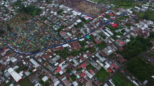 Aerial view of crowded kite festival in Sumpango, Guatemala.
