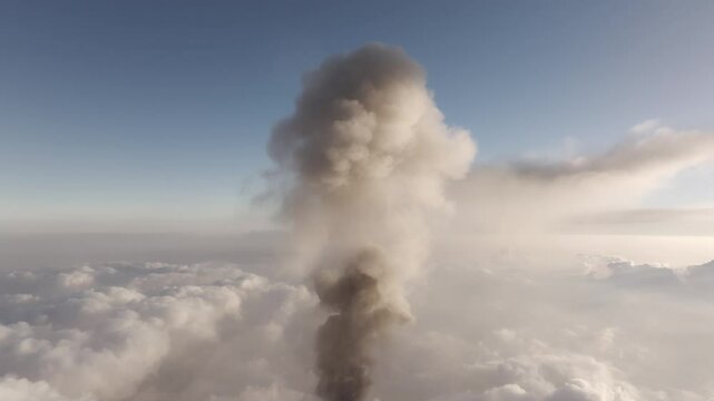 Aerial view of erupting volcano with smoke and crater, Fuego, Chimaltenango, Guatemala.
