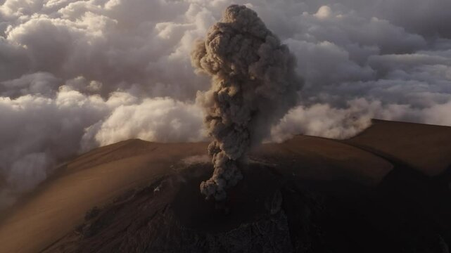 Aerial view of erupting volcano with smoke and crater, Fuego, Chimaltenango, Guatemala.