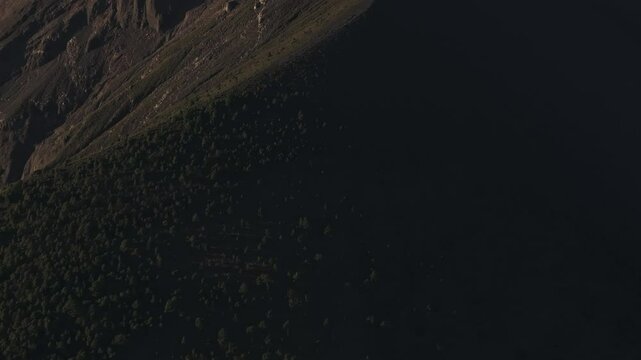 Aerial view of erupting Volcano Fuego with smoking crater, Chimaltenango, Guatemala.