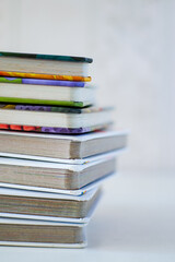 Stack of children story books on the white table