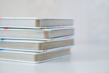 Stack of children story books on the white table
