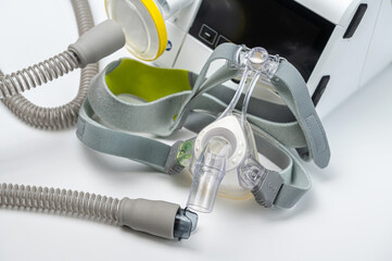 CPAP machine with mask and hose, for people with sleep apnea, respiratory, or breathing disorder
