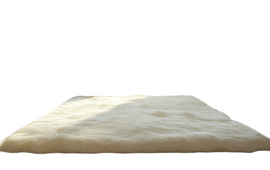 Obraz premium A soft white fur rug lays flat, catching the warm glow of the sun