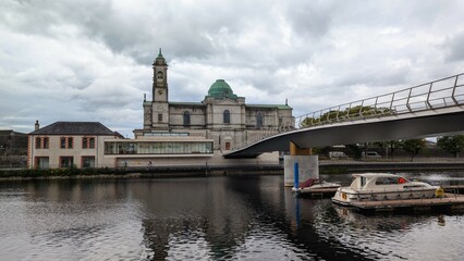 Beautiful old cityscape scenery, Church of Saints Peter & Paul  by Shannon river at Athlone, town in Westmeath, Ireland, landmark and architecture background