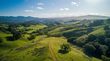 Capture the serene beauty of rolling hills and lush valleys from an aerial perspective.