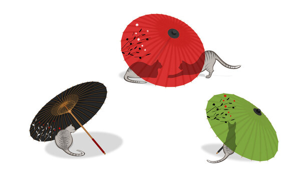 Cats relaxing in the shade of a Japanese umbrella