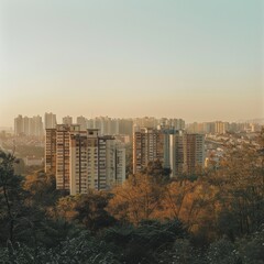 Obraz premium A panoramic view of a city from a distance, with a few tall buildings standing out against the horizon 