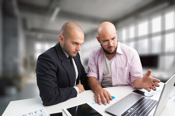 Young manager talking with colleagues having meeting