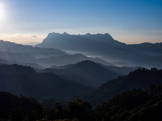 Doi Luang Chiang Dao mountain at dawn with blue tone sunrise sky. Chiang Mai - Thailand