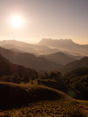 Doi Luang Chiang Dao mountain at dawn with golden hour sunrise sky. Chiang Mai - Thailand