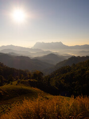 Doi Luang Chiang Dao mountain at dawn with golden hour sunrise sky. Chiang Mai - Thailand