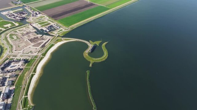 Aerial view of Tulpeiland island with tulip shape on Wolderwijd lake, Zeewolde, Flevoland, Netherlands.