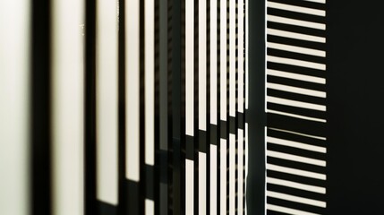 Pattern of light and shadow on a wall creating abstract shapes.