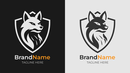 Black and white logo with an angry fox head backed by a shield