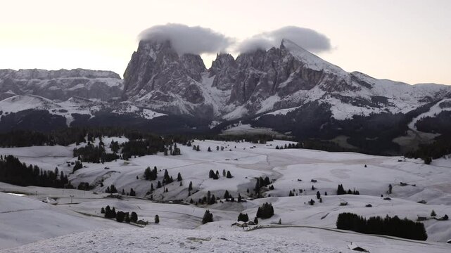 Mountains and hills with snow at sunrise