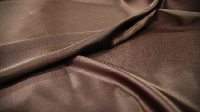 Close up of brown silk background